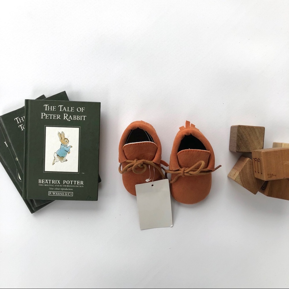 Brand New, with tags, baby moccasins